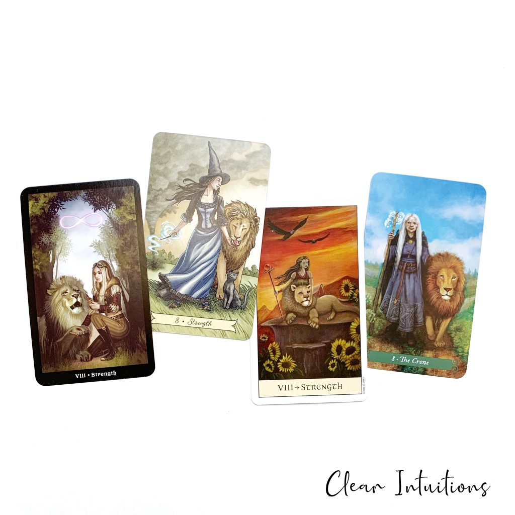 Tarot by Comparison™ - Strength Tarot Card Meaning 2 Strength Tarot Card - Green Witch Tarot, Everyday Witch Tarot, Steampunk Tarot, Crystal Visions Tarot